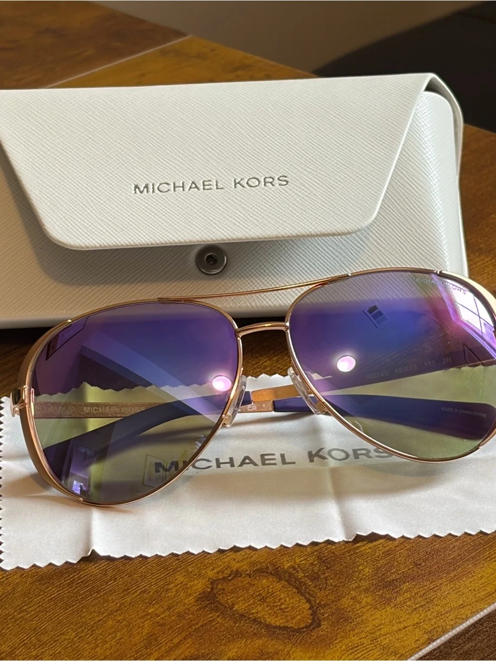 Michael Kors Rose Gold Aviator Sunglasses with Purple Gradient Lenses